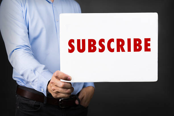 istock Businessman holding white board with SUBSCRIBE WORD 508920602