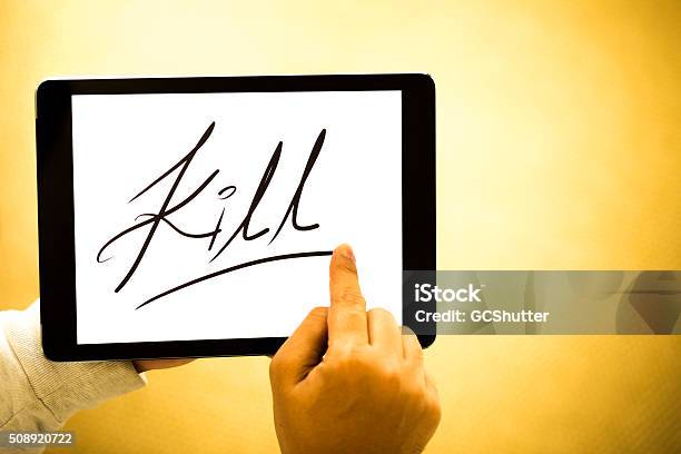 Word Kill On A Digital Tablet Stock Photo - Download Image Now - Abstract, Artist, Arts Culture and Entertainment