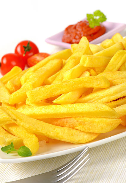 istock French fries with tomato sauce 508921446