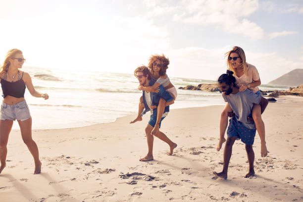 istock Group of friends having fun on the beach 508921722