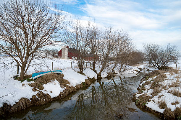 istock Creek Flowing through Snowy Field 508922484