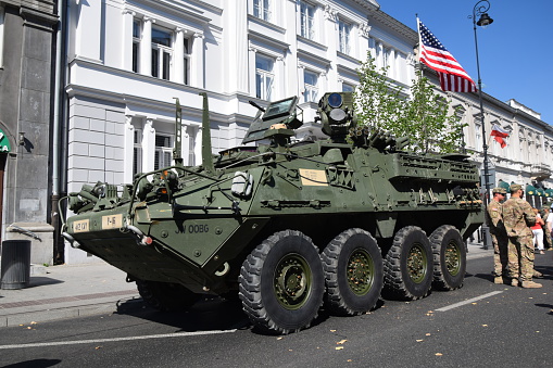 Warsaw, Poland, 15,th August 2015: The military wheeled armored vehicle Stryker stopped on the street before the parade on the Polish Armed Forces Day. The Stryker vehicle is powered by diesel engine (pushing out 350 HP). This vehicle was created for example for the army forces in Iraq, but many vehicles we could see in Afghanistan and in other military conflicts.