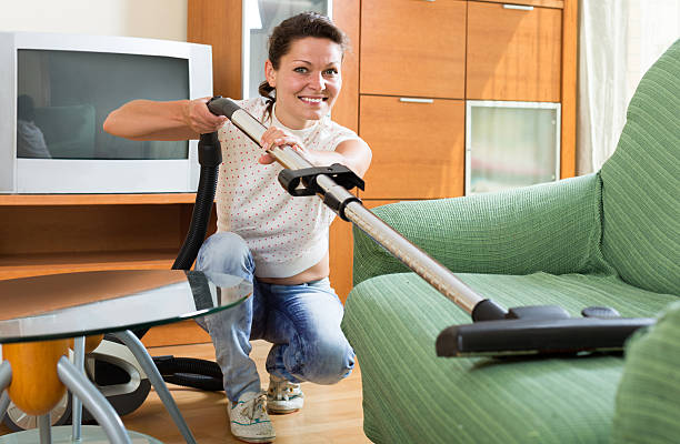 istock woman hoovering apartment 508922812