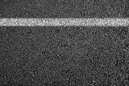 Photo of dark asphalted surface background