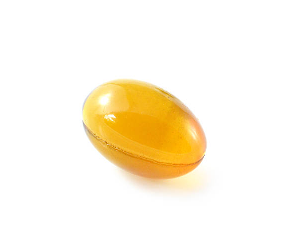 istock Cod liver oil omega 3 gel capsules isolated on white 508935333
