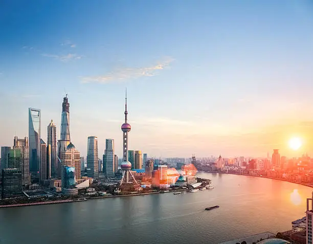 beautiful shanghai at dusk ,  huangpu river and financial district skyline in sunset