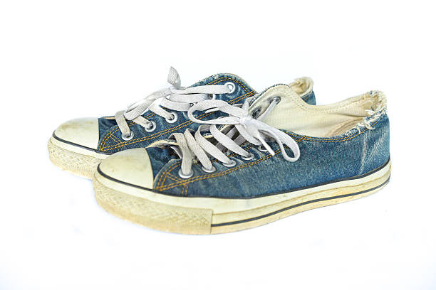 istock dirty used shoes 508936513