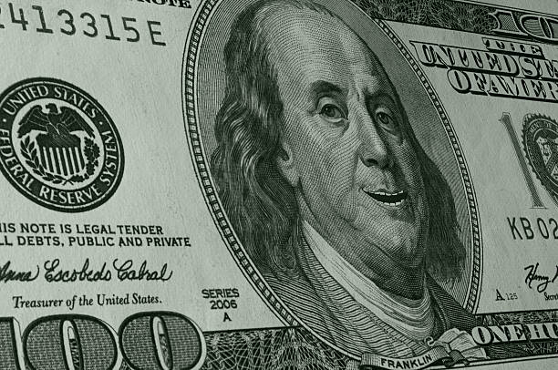 istock Ben Franklin Smiling on Hundred Dollar Bill 508937789