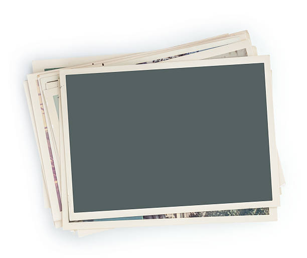 Stack of photos isolated Stack of photos isolated torn nobody past brown stock pictures, royalty-free photos & images