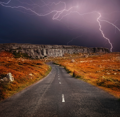 lightning storm approaching. Coastal road at Buren, Ireland
