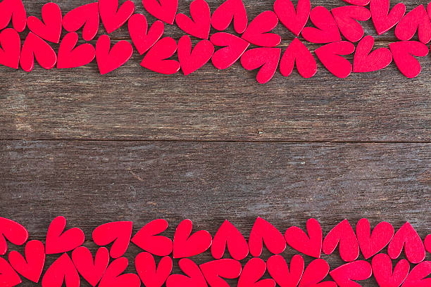 istock Frame made by hearts on wood background 508938758