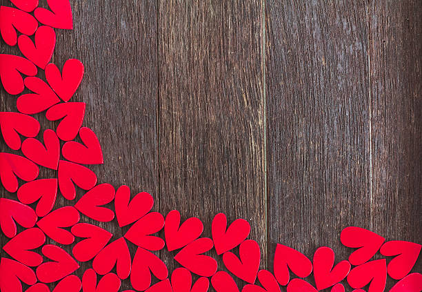 istock Frame made by hearts on wood background 508939080