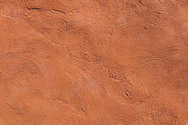istock Orange grunge cement wall, textured background 508941445
