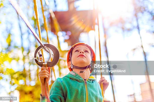 Boy In The Rope Park Looking Up Stock Photo - Download Image Now - Child, Obstacle Course, Summer Camp