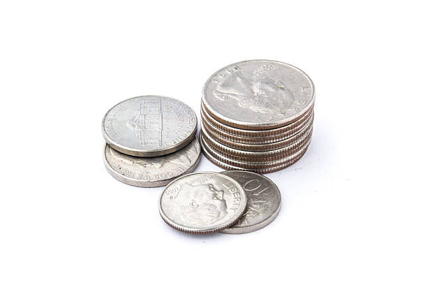 istock US coins on isolated white background 508941711