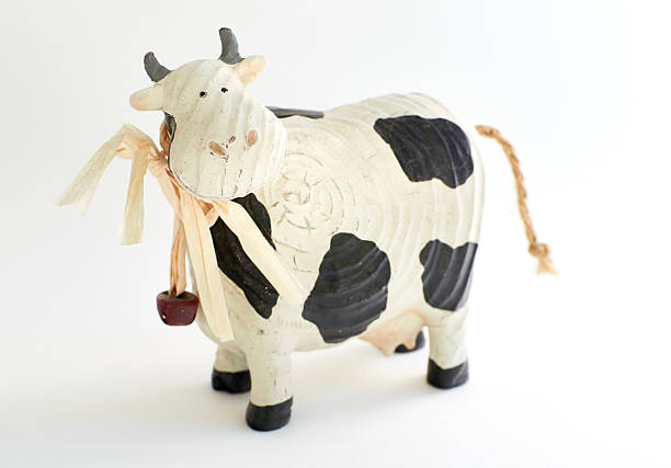 istock cute wooden cow toy 508943984