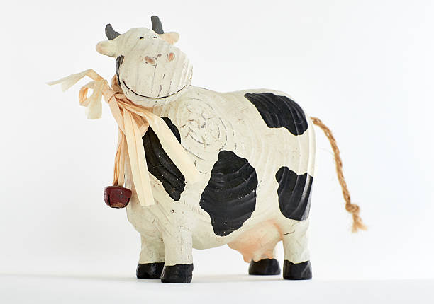 istock cute wooden cow toy 508944152