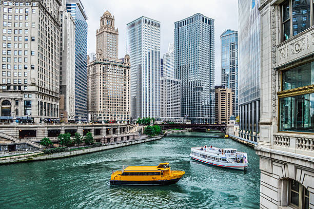Chicago Urban Cityscape along the Chicago River Chicago Urban Cityscape along the Chicago River lake michigan photos stock pictures, royalty-free photos & images