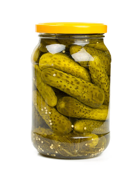 jar of pickles jar of pickles isolated on white pickled stock pictures, royalty-free photos & images