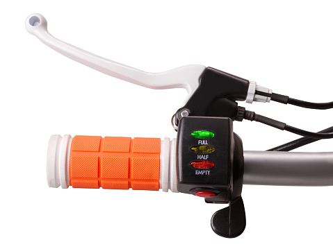 Close-up of control handle of electric bike with brake crank battery indicator and power switch isolated on white with clipping path