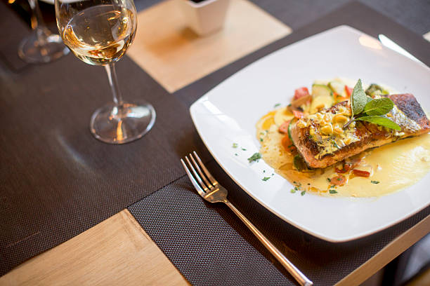 istock Grilled salmon with sauce and herbs 508951610