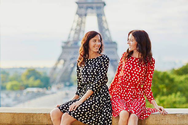 istock Beautiful twin sisters in front of the Eiffel tower 508951618