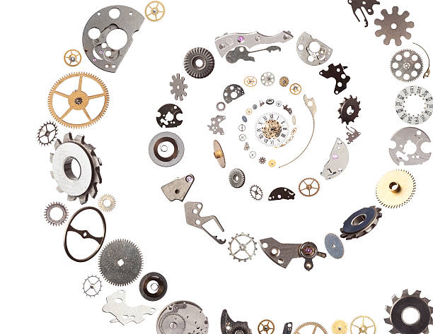 Clockwork gears and parts flying and falling into center of spiral on white background.In the center of spiral a watch is placed.Large group of gears are used.All objects are photographed separately with medium format camera Hasselblad in studio and combined together with software.