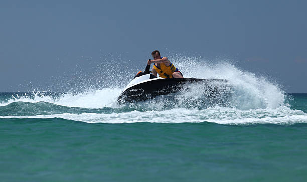 istock man drive on the jetski 508952300