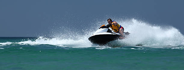 istock man drive on the jetski 508952372