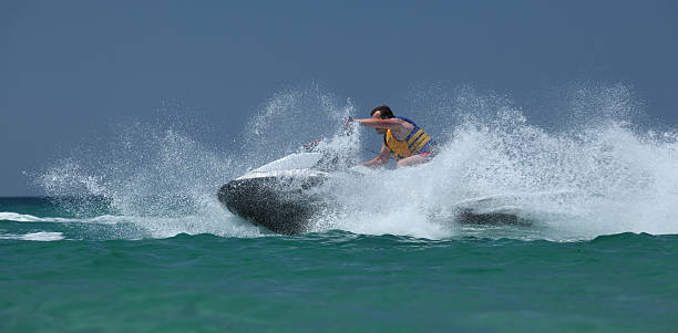 istock man drive on the jetski 508952444