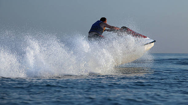 istock man drive on the jetski 508952542