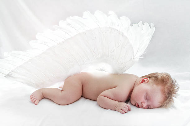 istock Angel baby sleeping in summer day at home 508953542