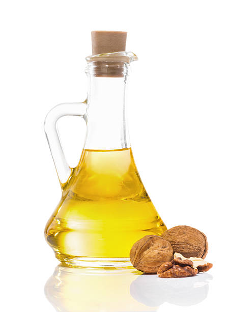 istock Walnut oil in a glass transparent bottle 508954764