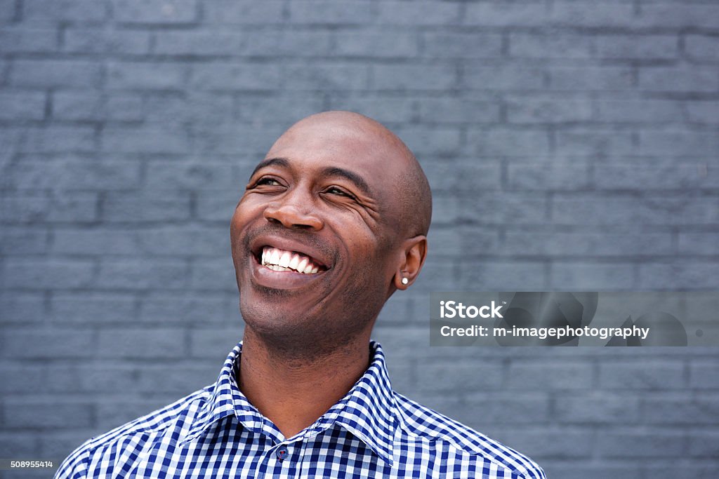 African american man laughing Close up portrait of african american man laughing Men Stock Photo