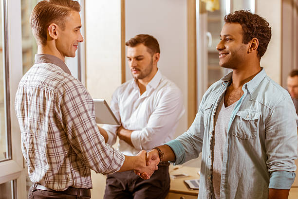 istock Young handsome businessmen coworking 508956040