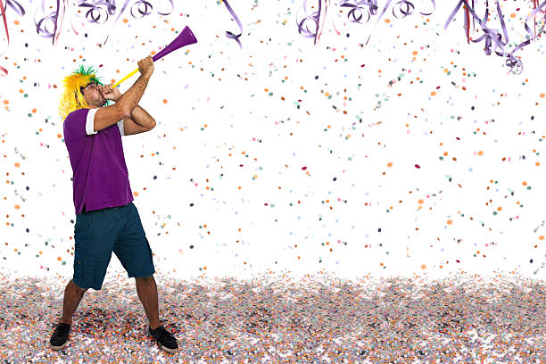 istock Brazilian guy blowing a horn at Carnival 508956438