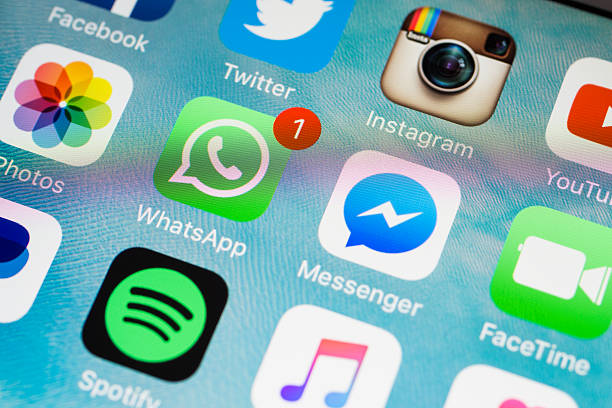 Istanbul, Turkey - February 6, 2016: Apple iPhone 6s screen with social media applications icons Facebook, Instagram, Twitter, Spotify, Youtube, Messenger, Paypal, Whatsapp etc.