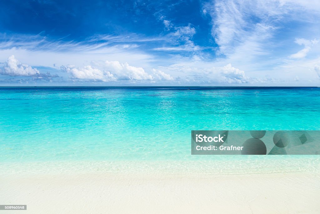 paradise beach with turquoise blue water white sand beach with turquoise blue water Beach Stock Photo