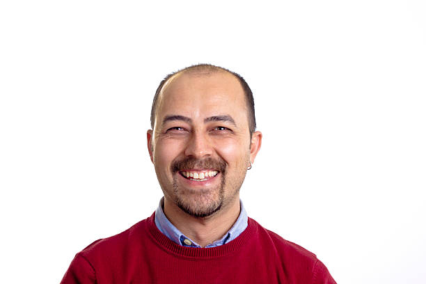istock happy young man smiling at the camera isolated 508960770