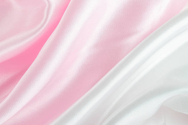 istock Abstract background - Pink and white satin textile 508962534