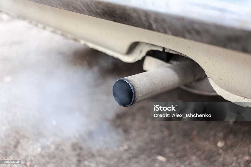 car exhaust pipe Combustion fumes coming out of car exhaust pipe Exhaust Pipe Stock Photo