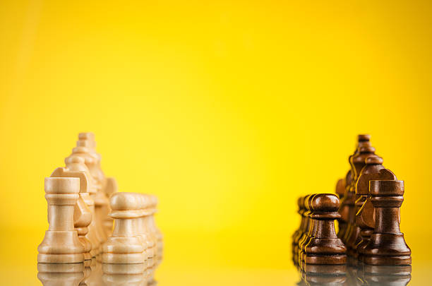 istock opposition of black and white pieces 508963605