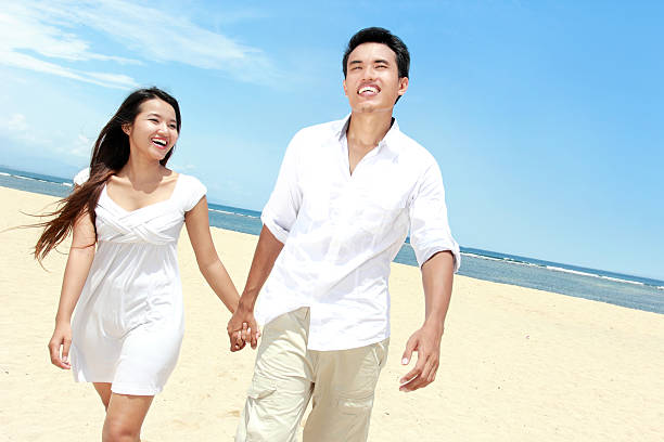 istock romantic young couple on the beach 508964223