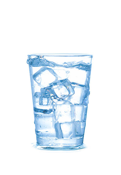 istock Glass of water with ice cubes isolated on white background 508964564