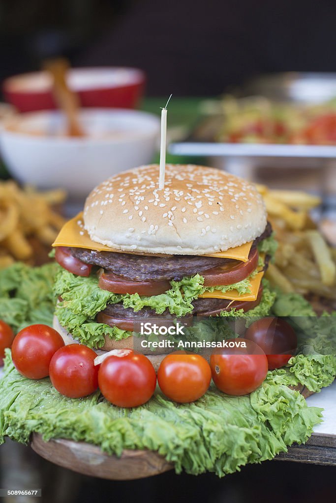Burger on the market Picture of a big burger on the market Agriculture Stock Photo