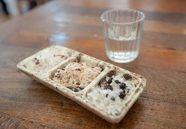 Photo of Shot of mezcal and sal de gusano, mexican drink, Oaxaca