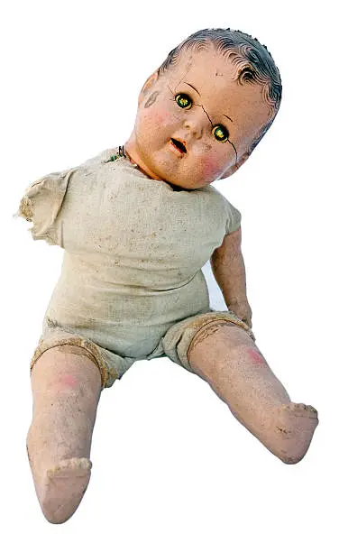 Scary spooky vintage doll baby. Isolated. Vertical.