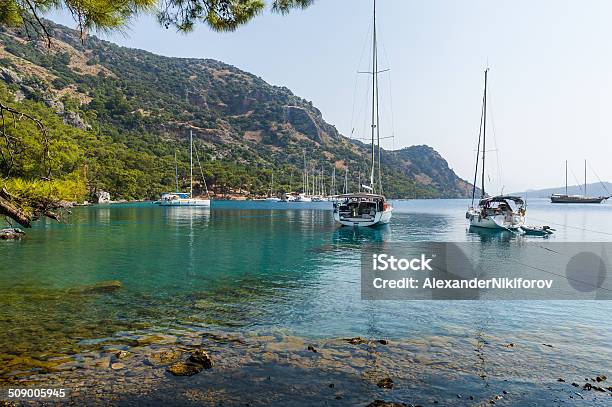 Sailing Yachts Anchorage At Beautiful Calm Bay Stock Photo - Download Image Now - Anchor - Vessel Part, Anchored, Asia