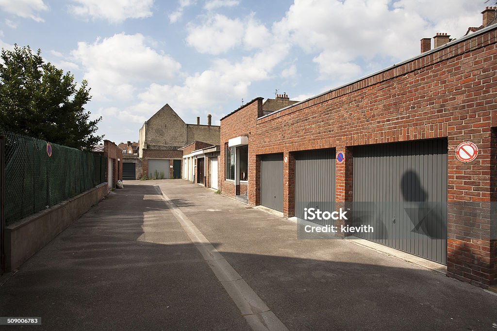 Garage doors Garage doors at the backside of the houses in Bergues, France Garage Stock Photo