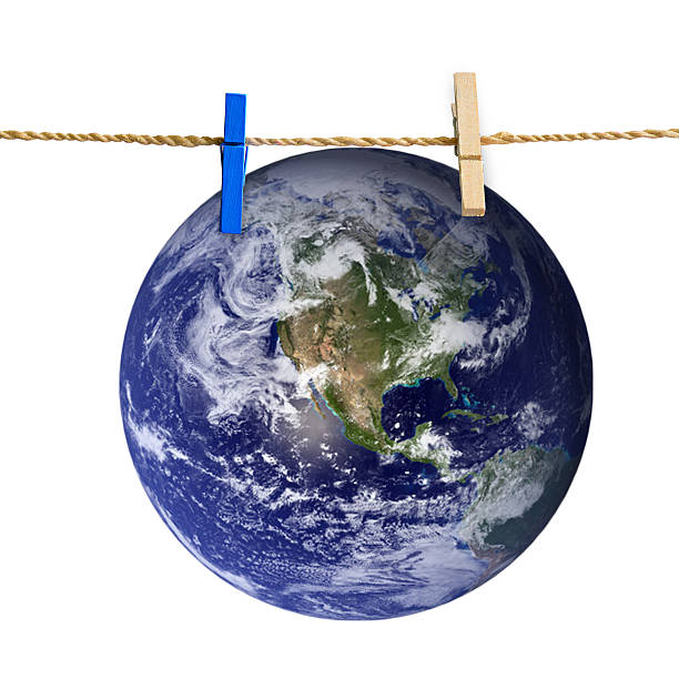 istock Planet earth attached to rope with clothes pins 509007053